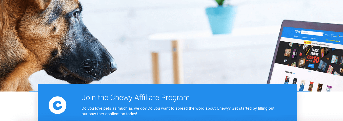 Screenshot of Chewy’s affiliate program page, featuring a German Shephard looking at a computer screen displaying Chewy’s website.