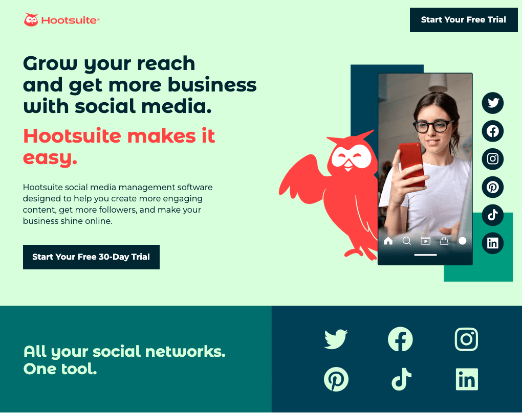 The image displays the homepage of Hootsuite with a featured icon of an owl and a woman on her phone. The website states, “Grow Your Reach and get more business with social media. Hootsuite makes it easy,” with the option to sign up for a 30-day free trial.
